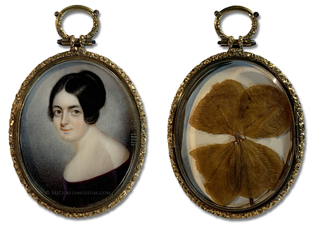 Portrait miniature of a Jacksonian Era American lady (artist unknown) with a rare, dry-pressed four-leaf clover to the reverse